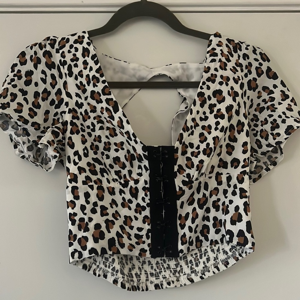 Forever 21 Cream and black corset cheetah crop top